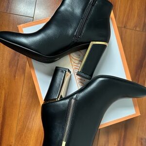 Sleek Black Ankle Booties with Gold Heel Accent